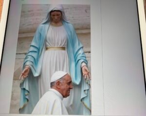 The Pope praying to the image of Mary